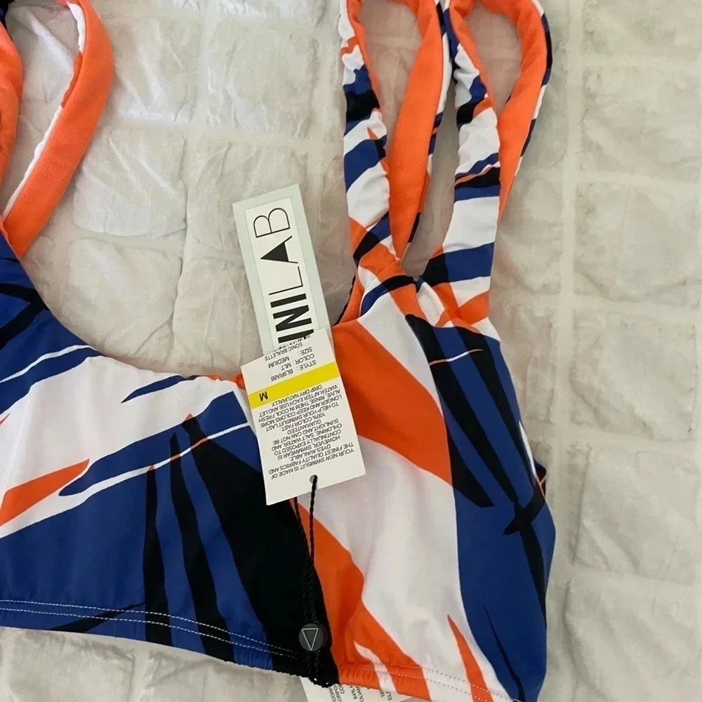 The bikini lab orange blue printed bikini top